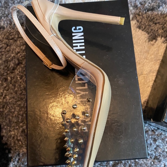 Clear Studded Heels Runs 1/2 small. - Picture 2 of 2